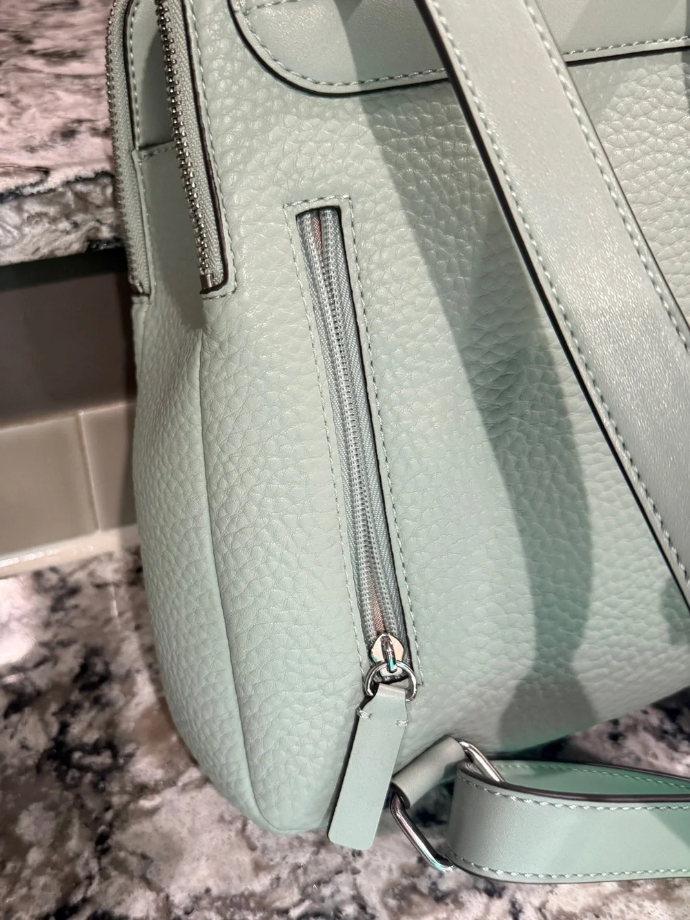 Calvin Klein Soft Mint Pebbled Leather Backpack. New without tags.